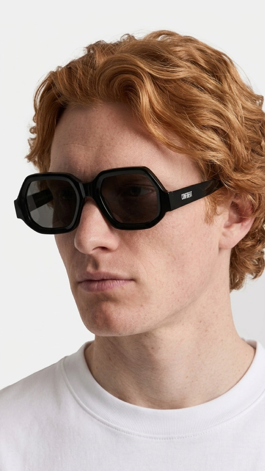 a man wearing CONFILVARO_Black_Geometric_Sunglasses