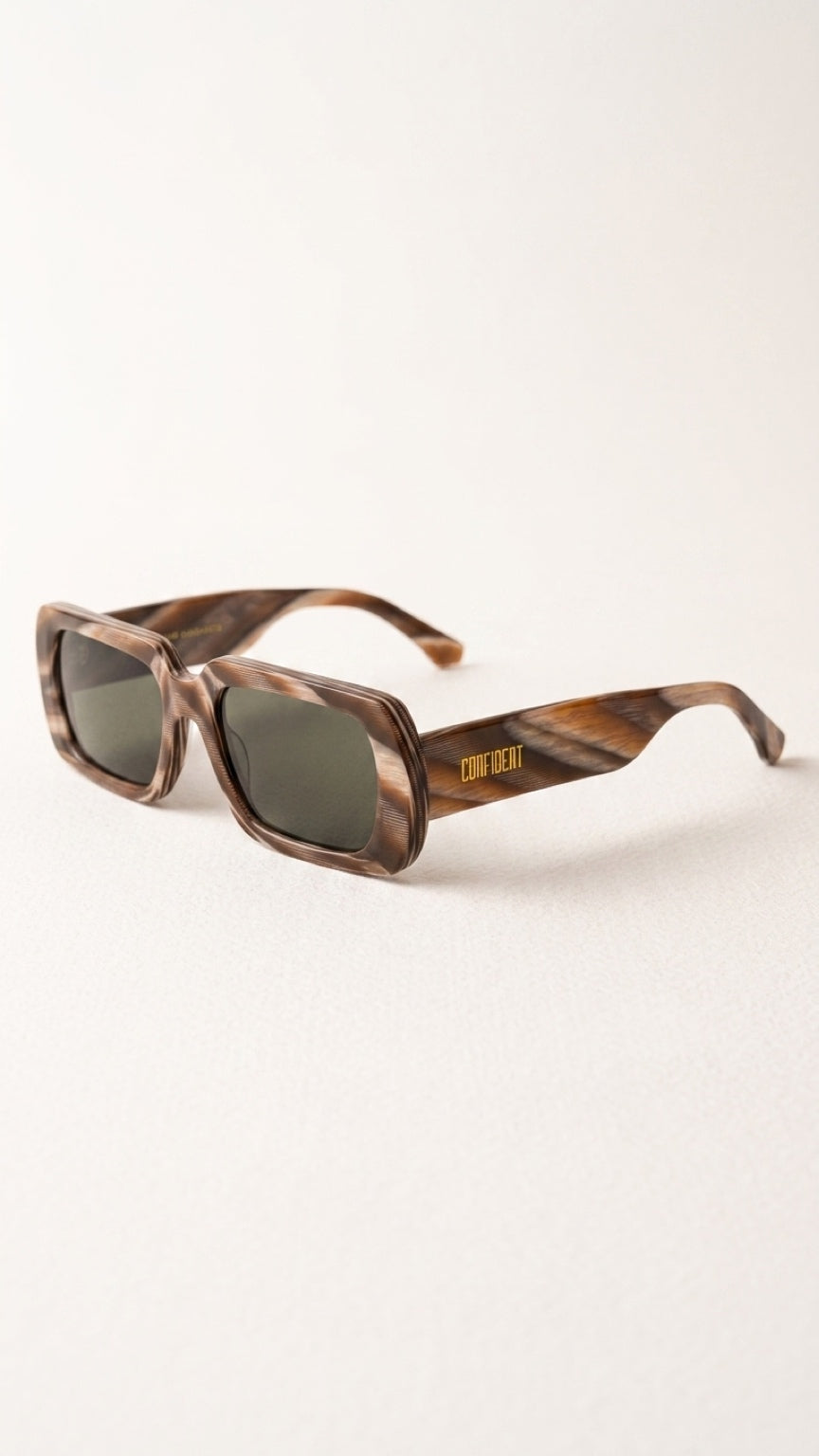 Angled front view of CONFILVARO oversized brown tortoiseshell-effect rectangle sunglasses with dark lenses