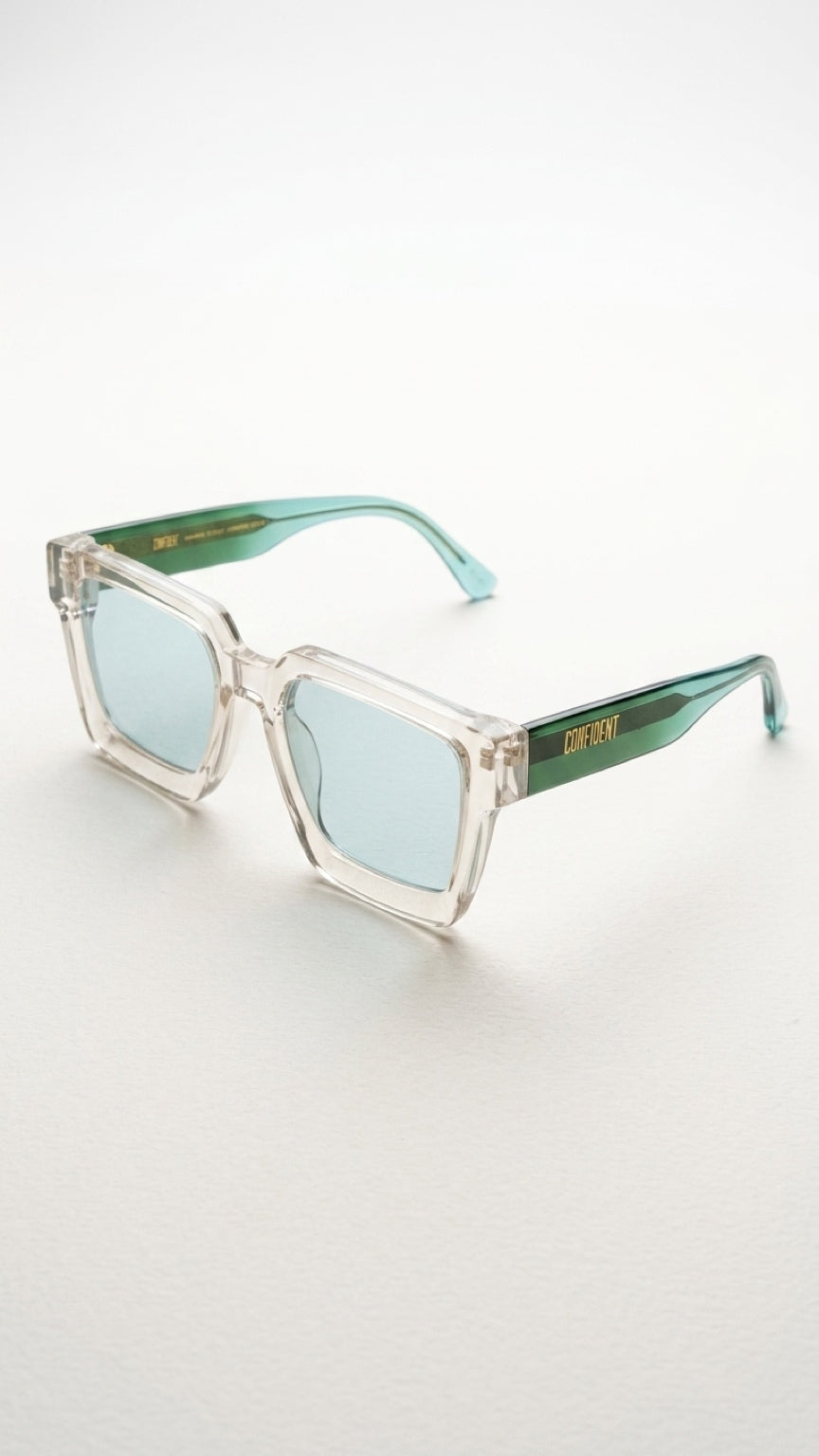 Angled front view of CONFILVARO transparent green rectangle sunglasses with green temples and lenses