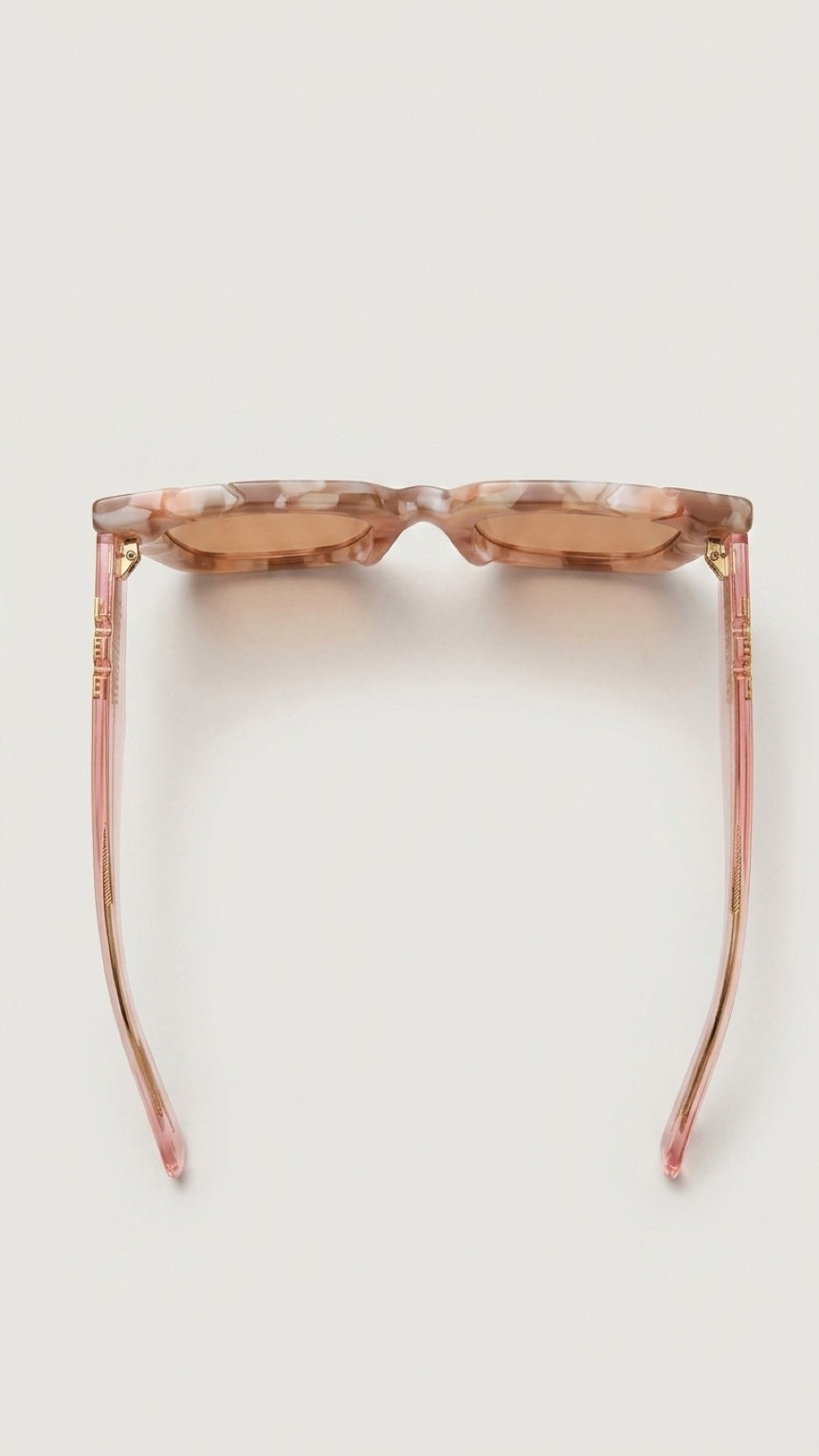 Rear view of CONILVARO pink tortoiseshell-effect square sunglasses showing pale pink temples